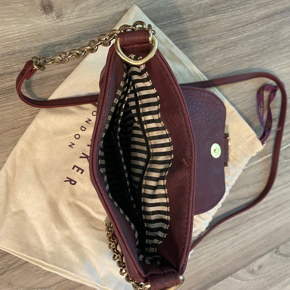 Charming Charlie purple faux leather purse.
